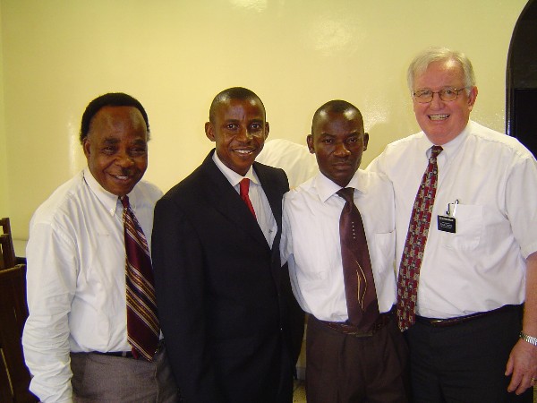 Elder Markham with 3 LUAT Assistants
